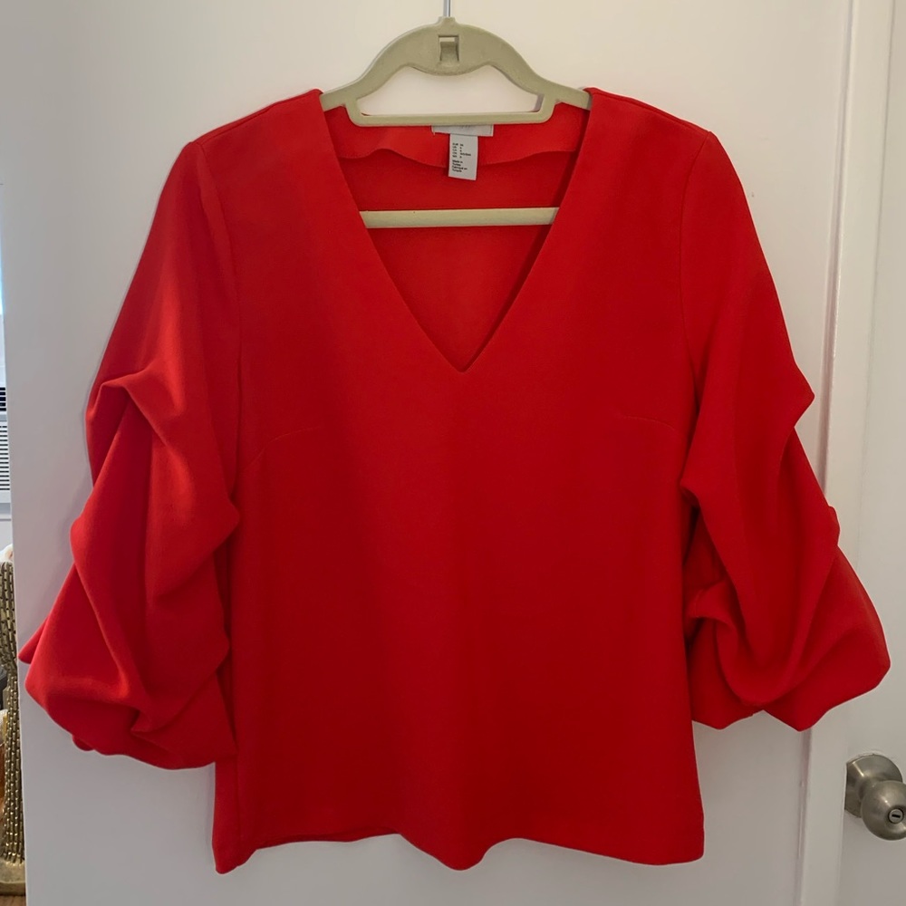 Red H&M bell sleeve blouse. Super on-trend sleeves